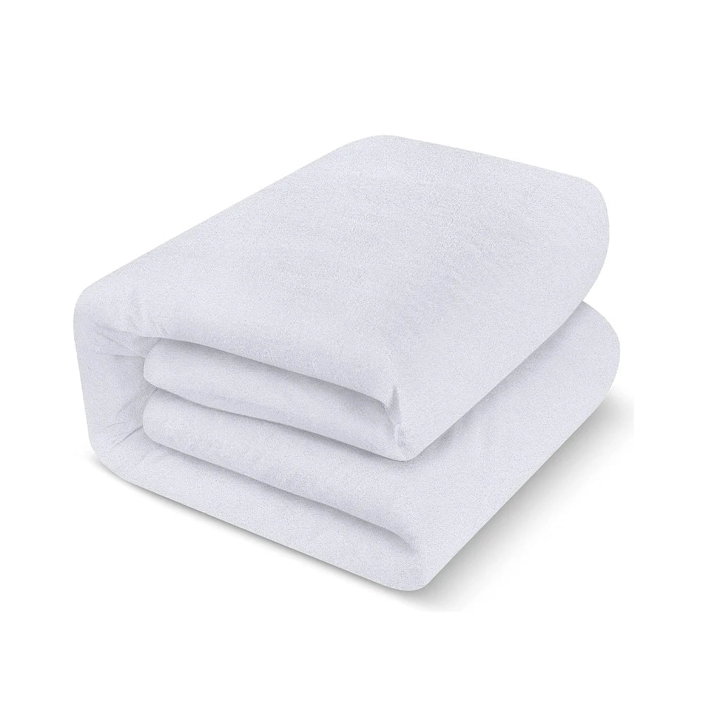 Folded white blanket on a white background