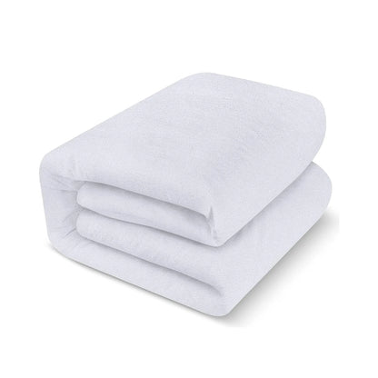 Folded white blanket on a white background